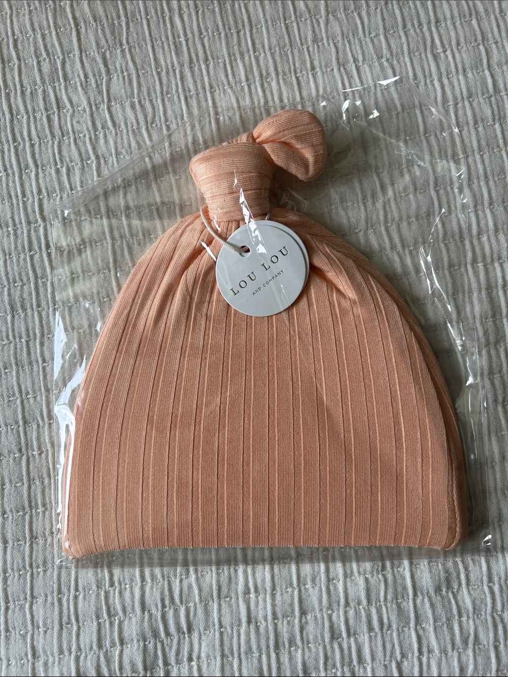 Lou Lou & Company Peach Ribbed Top-Knot Baby Beanie